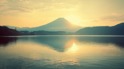 Mountain Peak View Over Calm Lake at Sunrise