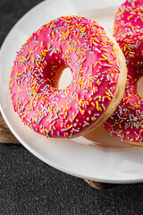 Donut sweet dessert fast food snack fresh delicious gourmet food background on the table rustic...
