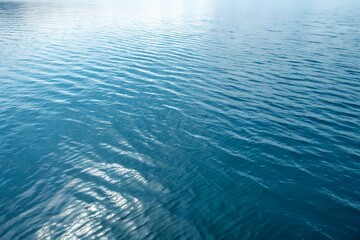 Obraz premium Calm Water Surface with Natural Ripples in Blue Tones