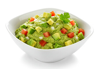 Fresh guacamole with visible chunks of avocado, tomato, onion and cilantro, served in a white bowl isolated on white