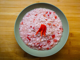 Background of plate with strawberry risotto