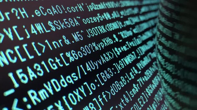 Abstract monitor or hacker display. Running blue colored lines of random strings on a dark background. Concept of artificial intelligence and computer science; Horizontal; Video