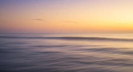 Fototapeta premium Serene Sunset Ocean Waves - Tranquil ocean waves at sunset, symbolizing peace, serenity, calmness, hope, and renewal