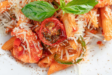 Portion of shrimp penne pasta with mexican sauce