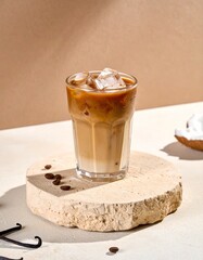 Iced coffee drinks on a neutral background