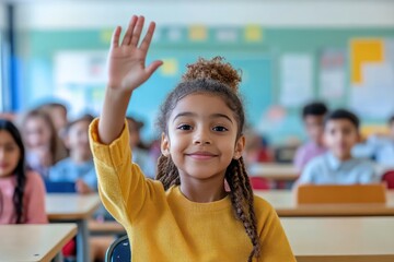 Engaged student raises hand in bright classroom