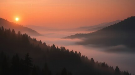 Obraz premium Serene Sunrise Over Misty Mountains and Forested Valleys