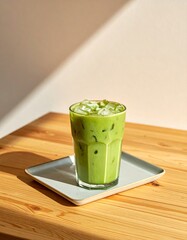 Iced matcha on a neutral background