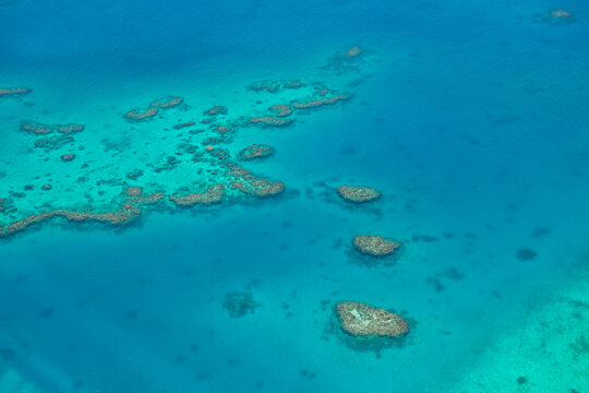 Aerial view of a tropical coral reef in the turquoise waters of the South Pacific Ocean, Fiji