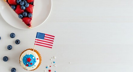 Obraz premium Patriotic Berry Pie Slice & Cupcake with American Flag Displayed on White Wood: Cheerful Celebration of Independence Day in Flat Lay Still Life