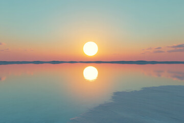 Obraz premium 3D render of a sunset over the ocean with a reflection, a blue sky, a large sun in the center, and yellow and orange colors