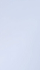 Obraz premium Light blue vertical gradient displaying a soft and smooth pastel color for use