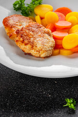 Vegetarian cutlet, boiled carrotbowl natural food vegetable dish organic fresh gourmet food background on the table rustic food top view copy space keto and paleo diet vegetarian and vegan food