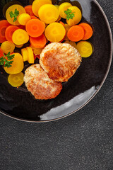 Vegetarian cutlet, boiled carrotbowl natural food vegetable dish organic fresh gourmet food background on the table rustic food top view copy space keto and paleo diet vegetarian and vegan food