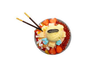 A colorful bingsu dessert with a scoop of ice cream, topped with fruit and other sweet toppings, and served in a bowl.