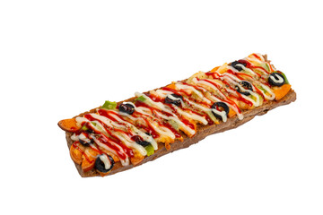 A long open-faced sandwich, possibly a Zapiekanka, topped with melted cheese, vegetables, and sauce, presented on a white background.