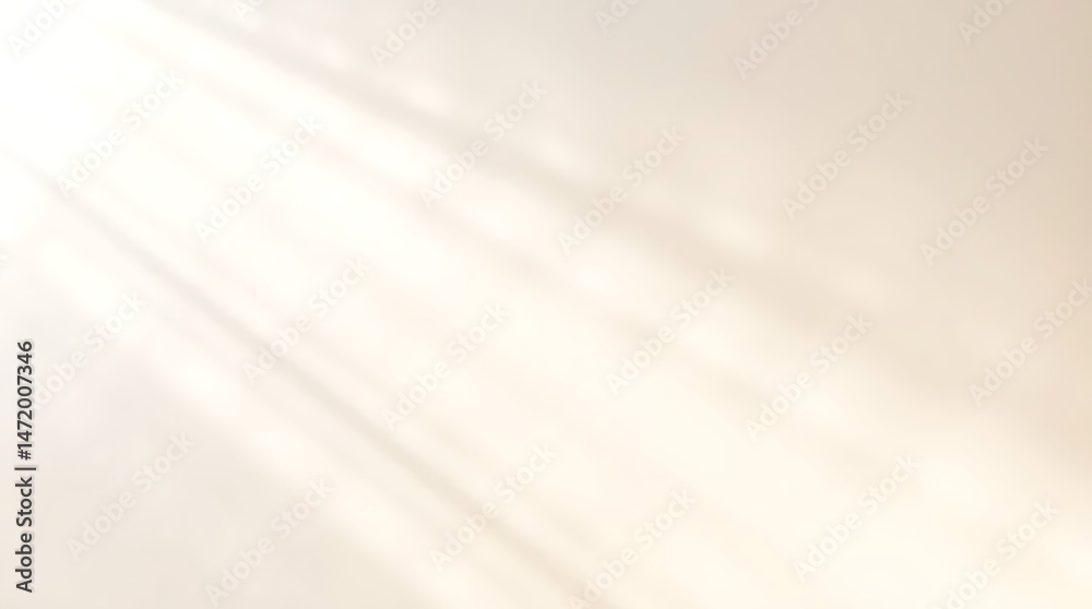 Wall mural an abstract background featuring soft, diagonal rays of light or shadow falling across a warm, pale 