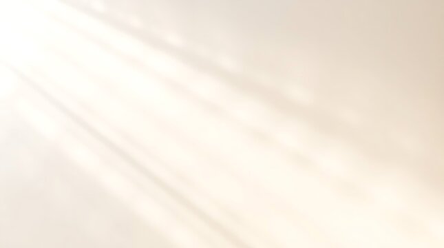 An abstract background featuring soft, diagonal rays of light or shadow falling across a warm, pale surface, creating a subtle and tranquil textural pattern.