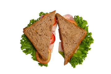 Two ham sandwiches with lettuce, tomato, and ham on whole-wheat bread are isolated on a white background.