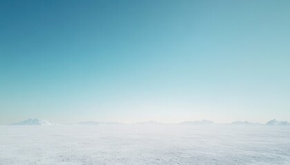 Fototapeta premium Vast Snowy Landscape under Pale Blue Sky in Winter with Icy Field and Open Horizon for Peaceful Cold Natural Scenery on Bright Frosty Day