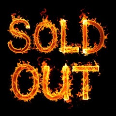 Fiery sold out text on black background with flaming letters