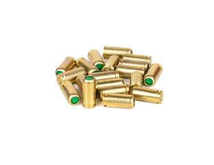 Several 9mm blank cartridges on a white background