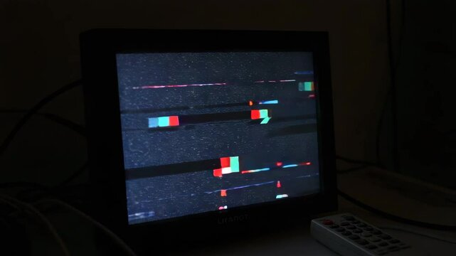 Glitchy Monitor Displaying Colorful Digital Disturbances  