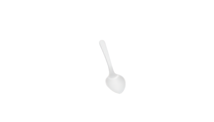 Closeup of a single white spoon against contrasting black background, study in minimalism