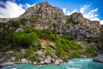 Water flowing through Les Gorges du Verdon in the Alpes de Haute Provence in southern France beside Hiking Trail