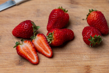 strawberries on wooden background