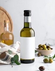 Obraz premium Olive oil bottle with blank label on kitchen countertop with fresh olives and herbs