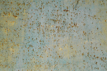 Abstract background. Old metal surface with rust and peeling paint.