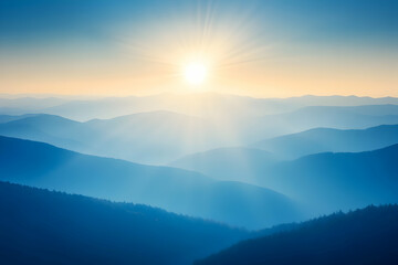 Fototapeta premium Sunrise over misty mountain ranges