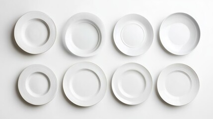 Various white plates arranged