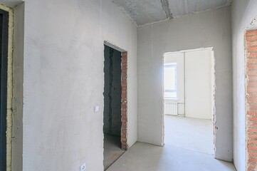 rough repairs for self-finishing. interior decoration, bare walls of the room, stage of...