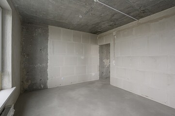 rough repairs for self-finishing. interior decoration, bare walls of the room, stage of...