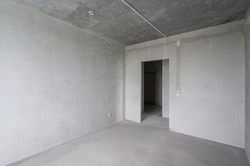 rough repairs for self-finishing. interior decoration, bare walls of the room, stage of construction. interior apartment room.