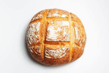 Fresh round bread isolated on white background.