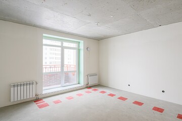 rough repairs for self-finishing. interior decoration, bare walls of the room, stage of construction. interior apartment room.