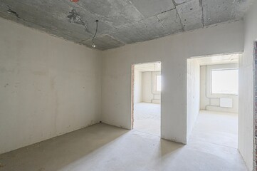rough repairs for self-finishing. interior decoration, bare walls of the room, stage of construction. interior apartment room.