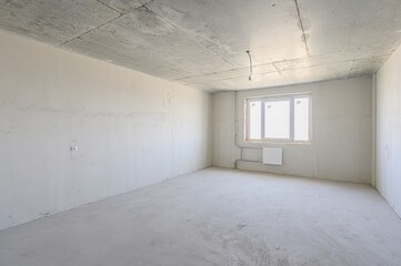 rough repairs for self-finishing. interior decoration, bare walls of the room, stage of construction. interior apartment room.