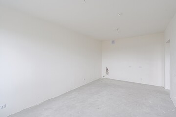 rough repairs for self-finishing. interior decoration, bare walls of the room, stage of construction. interior apartment room.