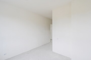 rough repairs for self-finishing. interior decoration, bare walls of the room, stage of...