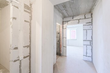 rough repairs for self-finishing. interior decoration, bare walls of the room, stage of...