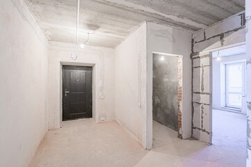 rough repairs for self-finishing. interior decoration, bare walls of the room, stage of construction. interior apartment room.