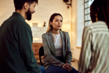 Group Therapy Session with Engaged Participants in a Supportive Setting