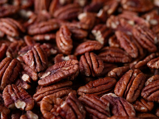 raw organic pecan nuts pattern background.