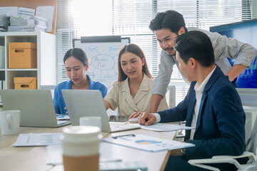 Financial professionals analyzing business data in office meeting, focusing on revenue, budgeting,...