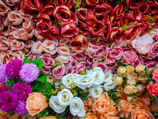 Flowers wall background with amazing pink, purple, red, yellow, orange, green and white chrysanthemum flowers ,Wedding decoration, hand made Beautiful flower wall background