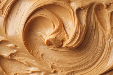 Obraz premium Creamy and Smooth Textured Peanut Butter Swirls Ideal for Culinary Creativity and Delicious Recipes in a Captivating Close-Up Shot